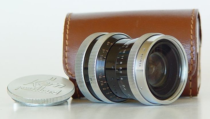 10mm Switar lens with leather case and lens cap