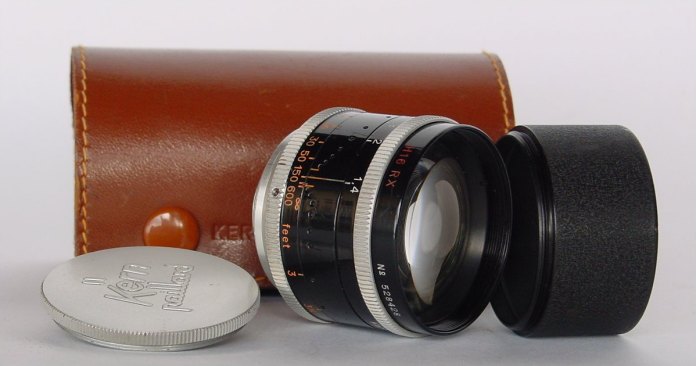 50mm Switar lens with leather case, lens shade and cap