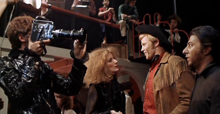 Dustin Hoffman and John Voight get filmed at the wacky party in the film Midnight Cowboy